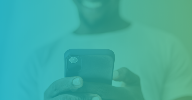 Digital marketer writing email copy on a phone.