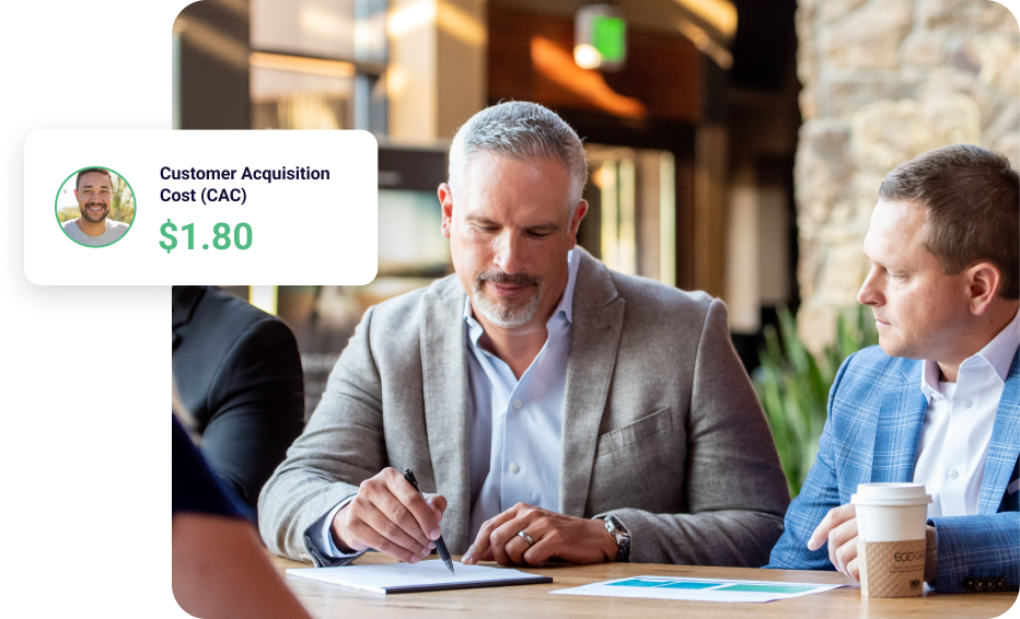 paid-media-2 Two digital marketers planning a paid media strategy